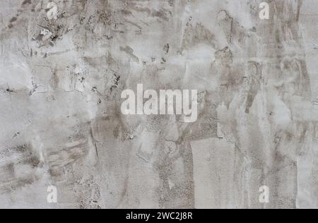 Cement wall covered with plaster. Stock Photo