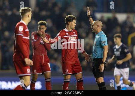 London, UK. 12th Sep, 2020. Hayden Hackney of Middlesbrough talks to Match referee Andy Davies during the Sky Bet Championship match Millwall vs Middlesbrough at The Den, London, United Kingdom, 13th January 2024 (Photo by Juan Gasparini/News Images) in London, United Kingdom on 9/12/2020. (Photo by Juan Gasparini/News Images/Sipa USA) Credit: Sipa USA/Alamy Live News Stock Photo