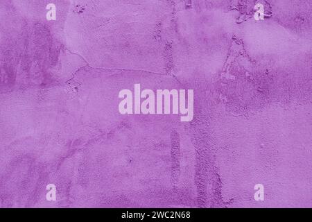Abstract grungy magenta texture for design. Purple cement wall. Stock Photo