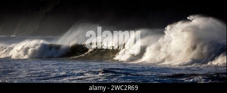 WA24688-01....WASHINGTON - The Pacific Ocean waves and James Island from Rialto Beach in Olympic National Park. Stock Photo