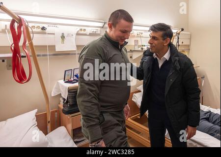 Kiev, Ukraine. 12th Jan, 2024. British Prime Minister Rishi Sunak, right, visits wounded soldiers with Ukrainian President Volodymyr Zelenskyy at a military hospital, January 12, 2024 in Kiev, Ukraine. Earlier Sunak announced the United Kingdom would provide Ukraine with more than $3 billion in additional military aid and future security guarantees. Credit: Ukraine Presidency/Ukrainian Presidential Press Office/Alamy Live News Stock Photo