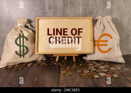 Wooden blocks with words 'LINE OF CREDIT'. Business concept. Stock Photo