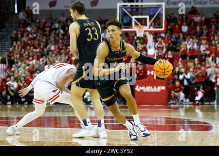 Madison, WI, USA. 13th Jan, 2024. Northwestern Wildcats guard Ty Berry (3) dribbles around a screen set by teammate forward Luke Hunger (33) during the NCAA basketball game between the Northwestern Wildcats and the Wisconsin Badgers at the Kohl Center in Madison, WI. Darren Lee/CSM/Alamy Live News Stock Photo