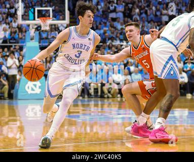 January 13, 2024: North Carolina senior Cormac Ryan (3) drives to the basket.NCAA basketball game between Syracuse and University of North Carolina at Dean Smith Center, Chapel Hill, North Carolina. David Beach/CSM Stock Photo