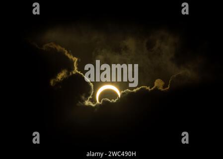 Partial Solar Eclipse of October 14, 2023 during sunset as seen from Natal, a city in Brazil Stock Photo