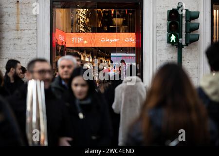 Rome, Italy. 13th Jan, 2024. A screen displaying the word 'sale' in different languages is seen at a boutique in Rome, Italy, Jan. 13, 2024. Credit: Li Jing/Xinhua/Alamy Live News Stock Photo