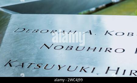 Memorial at Ground Zero Manhattan for September 11 Terrorist Attack with Engraved Names of Victims. Patriot Day - New York NY USA 2023-07-30 Stock Photo