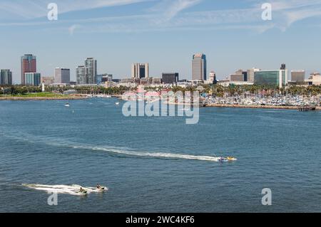 Long Beach, Los Angeles, California, USA -August 18, 2019. Motor boat race in the bay and the city skyline, viewed from Queen Mary Stock Photo