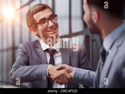 Two diverse business men analysts partners talking, working together Stock Photo