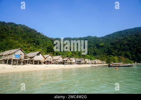 Traditional Thai long-tail diesel engine boat in Morgan village, Sea Gypsies Tribe settlement in the south of Thailand. Surin Islands, Andaman Sea, Ph Stock Photo