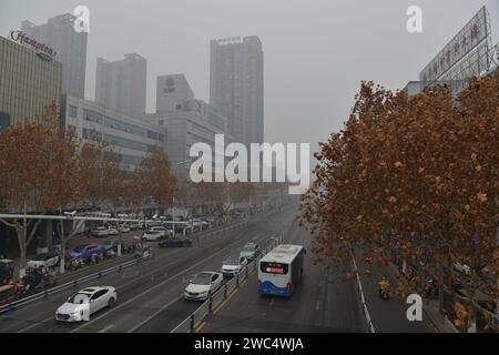 FUYANG, CHINA - JANUARY 14, 2024 - The urban area is shrouded in smog in Fuyang city, Anhui province, China, January 14, 2024. Stock Photo