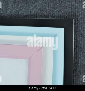 Blank picture frame on gray carpet in the room, stock photo Stock Photo