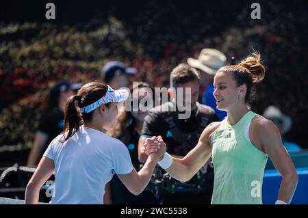 Melbourne, Australia. 14th Jan, 2024. Maria Sakkari (R) greets Hibino Nao after their women's singles first round match at the Australian Open tennis tournament in Melbourne, Australia, on Jan. 14, 2024. Credit: Hu Jingchen/Xinhua/Alamy Live News Stock Photo