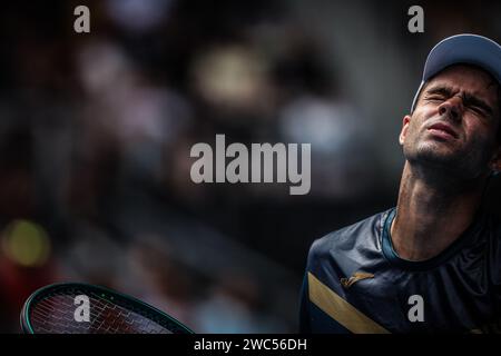 Melbourne, Victoria, Australia. 14th Jan, 2024. MELBOURNE, AUSTRALIA - JANUARY 14: Facundo Diaz Acosta of Argentina plays Taylor Fritz of USA on Day 1 of the 2024 Australian Open at Melbourne Park on January 14, 2024 in Melbourne, Australia. (Credit Image: © Chris Putnam/ZUMA Press Wire) EDITORIAL USAGE ONLY! Not for Commercial USAGE! Stock Photo