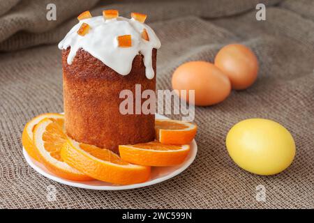 Festive cake and colored eggs for Easter. Stock Photo