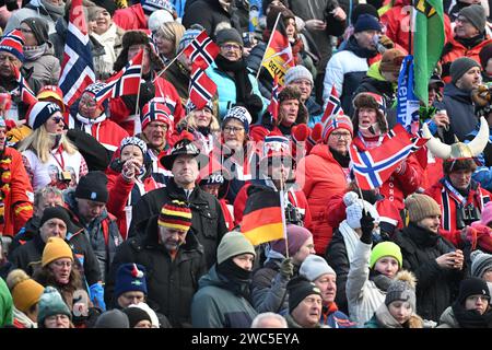 Ruhpolding, Germany. 14th Jan, 2024. Biathlon: World Cup, 10 km pursuit, women. The stands in the Chiemgau Arena are packed with spectators. Credit: Sven Hoppe/dpa/Alamy Live News Stock Photo