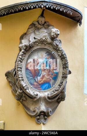 Madonna col Bambino and San Filippo Neri aedicula in Via di Panico corner Vicolo di San Celso, Rome, Italy Stock Photo