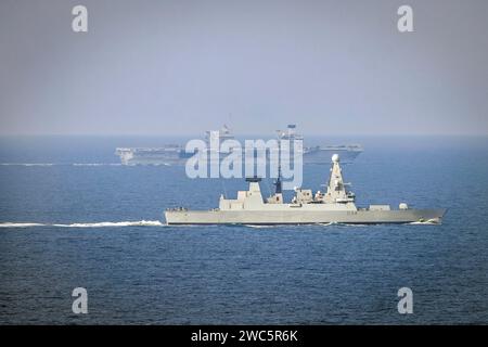 NORTH SEA - 14 September 2023 - Aerial view of HMS Queen Elizabeth and HMS Diamond in the North Sea where the two warships conducted a joint air exerc Stock Photo