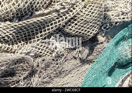 Old fishing net close-up. Texture of an old fishing net. Stock Photo
