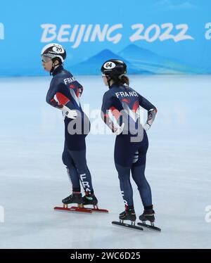 FEB 5, 2022 - Beijing, China: Tifany HUOT MARCHAND and Gwendoline DAUDET of Team France in the Heats of the Women's 500m Short Track Speed Skating at Stock Photo