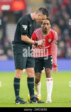 Southampton defender Kyle Walker-Peters  (2) protests with Referee Lewis Smith during the Southampton FC v Sheffield Wednesday FC sky bet EFL Championship match at St.Mary's Stadium, Southampton, England, United Kingdom on 13 January 2024 Stock Photo