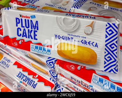 Italy - January 13; 2024: Plum Cake Kinder Ferrero prepared with Greek-style yoghurt in packages displayed for sale on the shelf of Italian supermarke Stock Photo