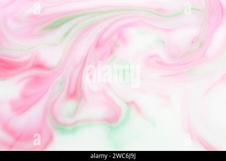 Background with red green streaks milky white background. Texture of marble Stock Photo