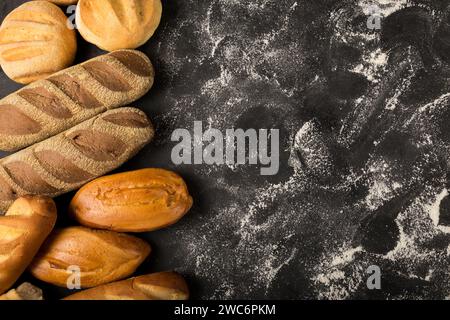 Bakery. Different types of fresh bread on the table. Stock Photo
