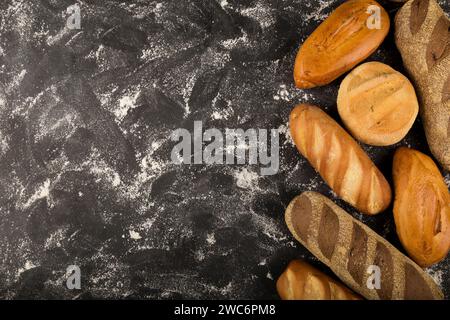 Bakery. Different types of fresh bread on the table. Stock Photo