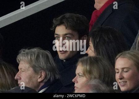 Mercedes F1 driver George Russell with girlfriend Carmen Montero Mundt in the stands during the Premier League match at Old Trafford, Manchester. Picture date: Sunday January 14, 2024. Stock Photo