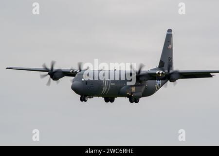 US Air Force Lockheed C-130 Hercules military transport aircraft landing in Lviv Airport after a training flight Stock Photo