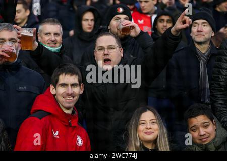 Rotterdam, Nederland. 14th Jan, 2024. ROTTERDAM, NEDERLAND - JANUARY 14: Fans and Supporters of Feyenoord during the Dutch Eredivisie match between Feyenoord and NEC Nijmegen at Stadion Feijenoord on January 14, 2024 in Rotterdam, Nederland. (Photo by Hans van der Valk/Orange Pictures) Credit: Orange Pics BV/Alamy Live News Stock Photo