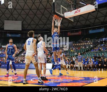 Kansas guard Johnny Furphy (10) tries to get past Chaminade forward ...