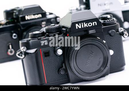 The iconic Nikon F3 camera body flanked by the Nikon F and F2 Classics, a tribute to the enduring legacy of Nikon's camera evolution . Stock Photo