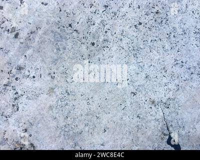 A bright and rough concrete backdrop on a white background. Stock Photo
