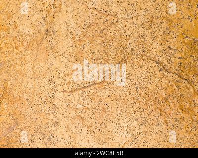 Dark concrete texture with a crumpled paper backdrop Stock Photo