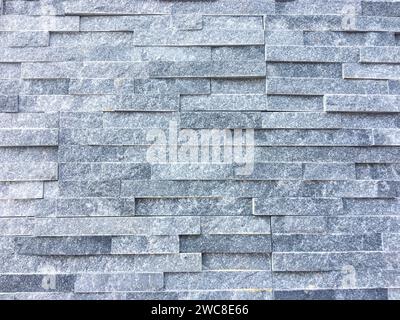 Dark concrete texture with a crumpled paper backdrop Stock Photo
