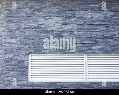 Dark concrete texture with a crumpled paper backdrop Stock Photo