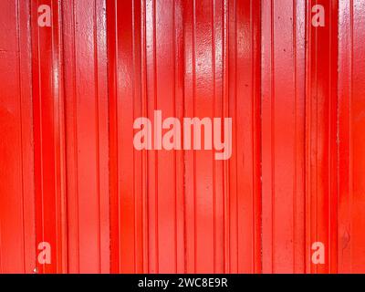 A beautiful red metal background, combining simplicity and elegance in design. Stock Photo