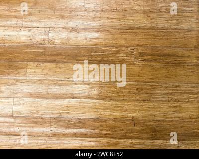 Walnut hardwood surface, showcasing a rich and deep brown tone for a luxurious feel. Stock Photo