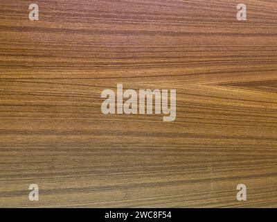 Walnut hardwood surface, showcasing a rich and deep brown tone for a luxurious feel. Stock Photo