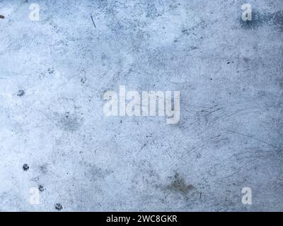 scratched concrete backdrop, giving your design a rustic and worn appearance Stock Photo