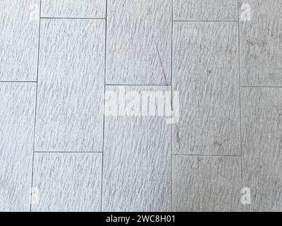 A bright and isolated concrete texture with a crumpled effect, creating visual interest. Stock Photo