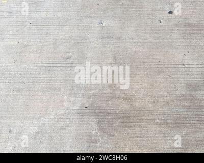 A bright and isolated concrete texture with a crumpled effect, creating visual interest. Stock Photo