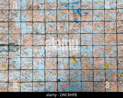 The stone-like texture of the concrete background lends a sense of authenticity. Stock Photo