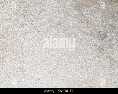 The rough surface of the concrete creates an interesting visual pattern. Stock Photo
