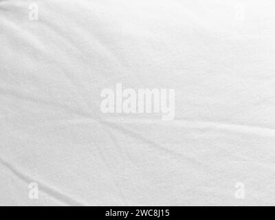 An exquisite cloth material in a bright, white hue, its smooth and silky surface evoking a sense of luxury and quality for a sophisticated background. Stock Photo