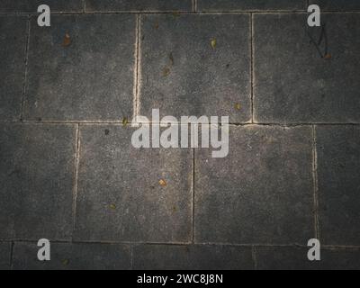 A black texture background featuring an abstract dark pattern, providing a visually striking design. Stock Photo