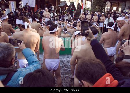 January 14 2024, Tokyo, Japan: The Icy Winter Bathing Tournament (Kanchu Misogi) at Teppozu Inari Shrine is accompanied by Prayers and celebrations for the New Year. Credit: Michael Steinebach/AFLO/Alamy Live News Stock Photo