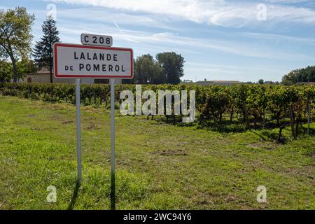 City road sign Lalande de Pomerol near Saint-Emilion wine making region, growing of Merlot or Cabernet Sauvignon red wine grapes, France, Bordeaux in Stock Photo